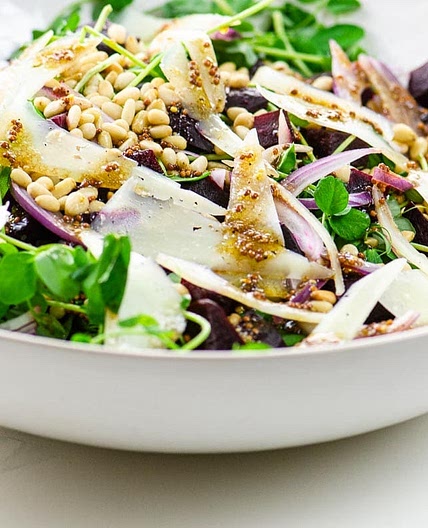 Pea Shoot Salad with Pine Nuts and Manchego