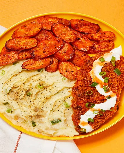 Crispy Frank’s RedHot®-Spiced Chicken with Blue Cheese Sauce, Scallion Mashed Potatoes & Carrots