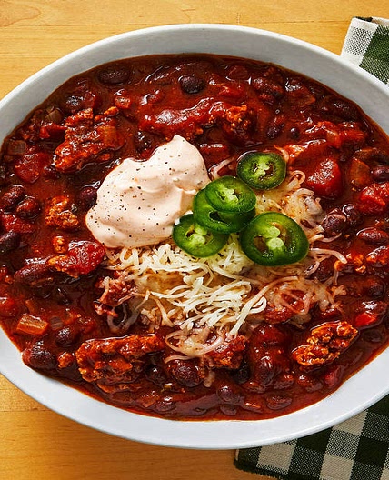 One-Pot Pork & Black Bean Chili with Spicy Crema & Monterey Jack Cheese