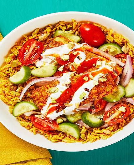 Shawarma-Spiced Halloumi with Pistachio Rice, Garlicky White Sauce & Israeli Salad