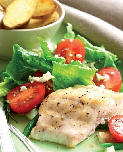Fish and chips with tomato salad