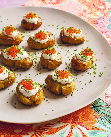 Smashed potatoes with crème fraîche and roe