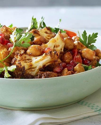 Warm spiced cauliflower and chickpea salad with pomegranate seeds