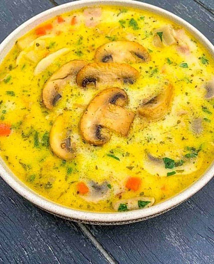 Creamy mushroom soup with fresh herbs