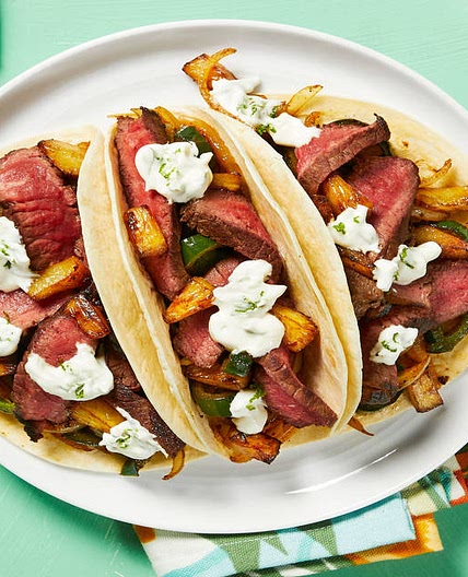 Marinated Steak Tacos with Charred Pineapple and Lime Crema