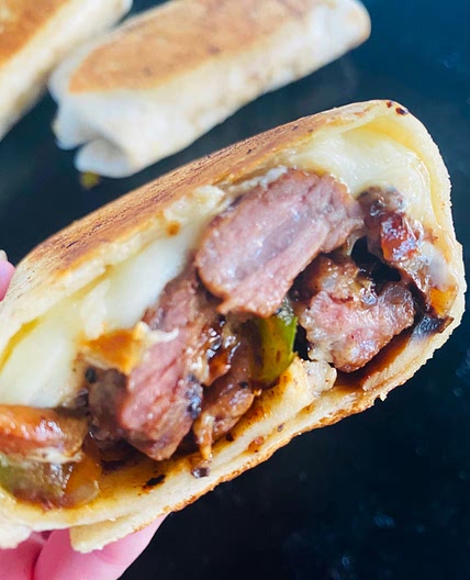 Blackstone Philly Cheesesteak Burritos