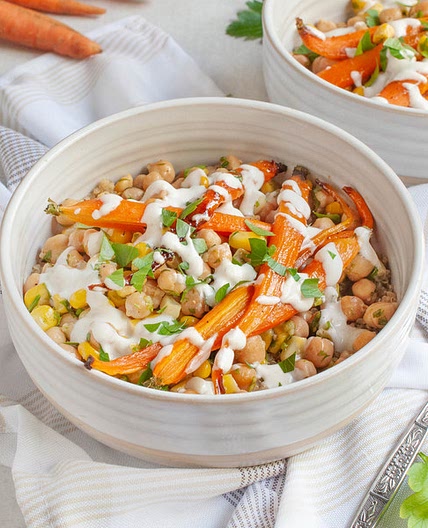 Quinoa Bowl with Roasted Carrots, Garlic-Lime Chickpeas & Cumin Yogurt