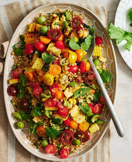 Grain salad with corn, olives & tomatoes