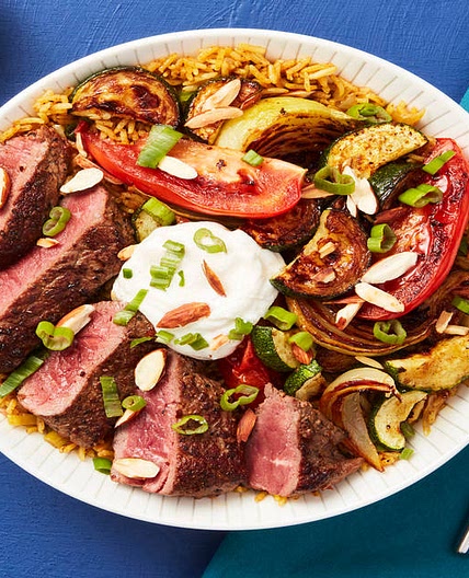 Middle Eastern Steak Bowls with Spiced Basmati Rice, Roasted Veggies & Lemon Garlic Yogurt Sauce