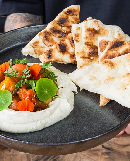 Grilled flatbread, whipped feta and blistered tomatoes