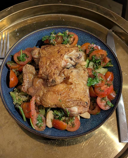 Chicken thighs with butter beans, courgettes, broccoli and a tomato salsa