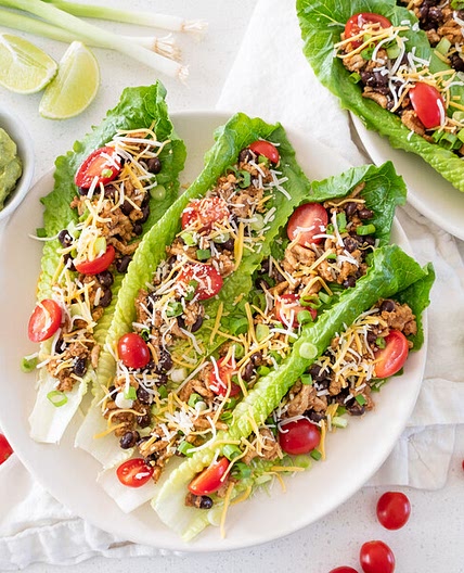 Chicken Taco Salad Boats with Black Beans, Tomato, Cheese & Guacamole