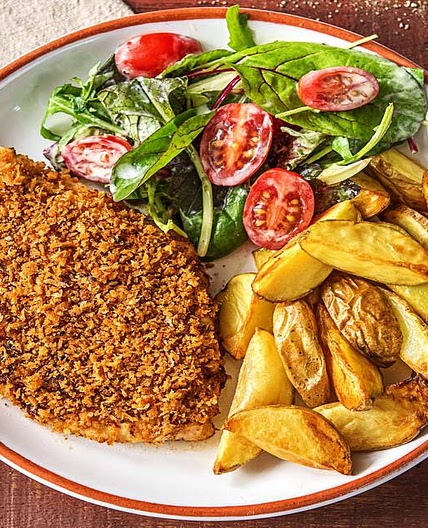 Zesty Breaded Chicken Breasts with Roasted Potatoes and Creamy Mixed Greens