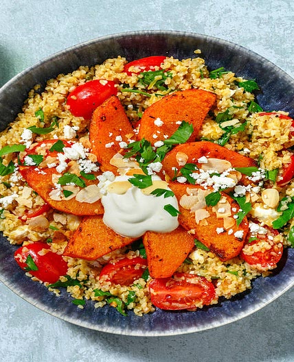 Harissa Roasted Sweet Potato on Herby Tabbouleh with Greek Style Cheese, Flaked Almonds and Yoghurt
