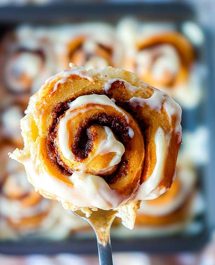 Pumpkin Cinnamon Rolls with Maple Cream Cheese Glaze