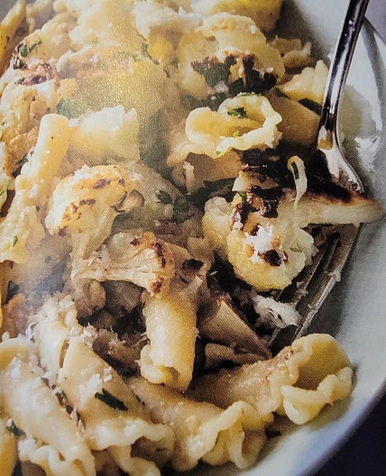 Pasta with roasted cauliflower, garlic, and walnuts