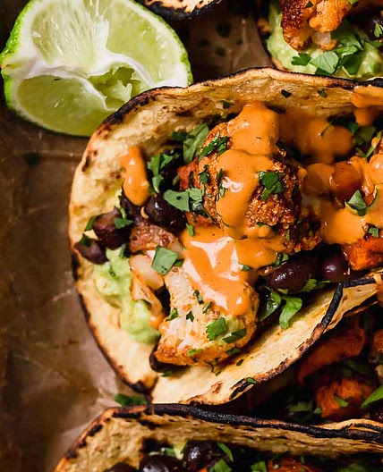 Roasted Sweet Potato & Cauliflower Tacos with Chipotle Cashew Crema