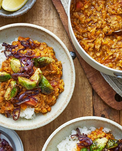 Red lentil and carrot dhal with spiced sprouts