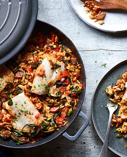 Baked chorizo orzo with white fish