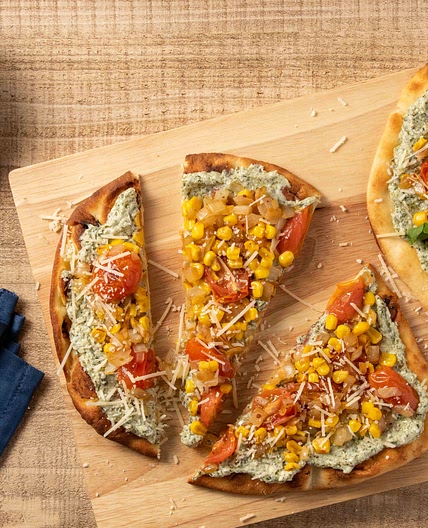 Basil Ricotta and Vegetable Flatbread with corn and arugula
