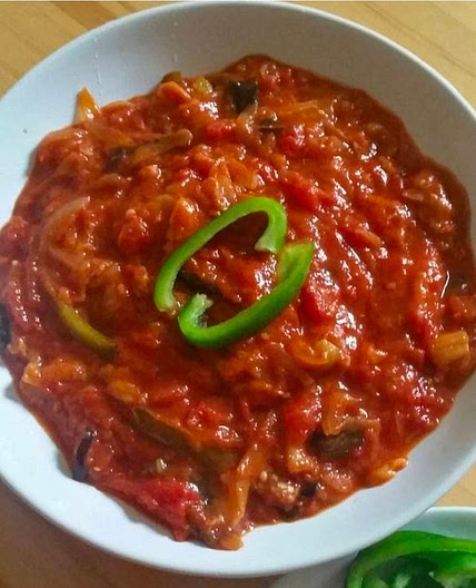 Eggplant with tomato sauce / بيتنجان مطبق