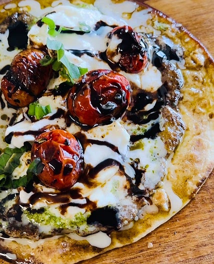 This Blackstone Smashed Caprese Chicken Tacos