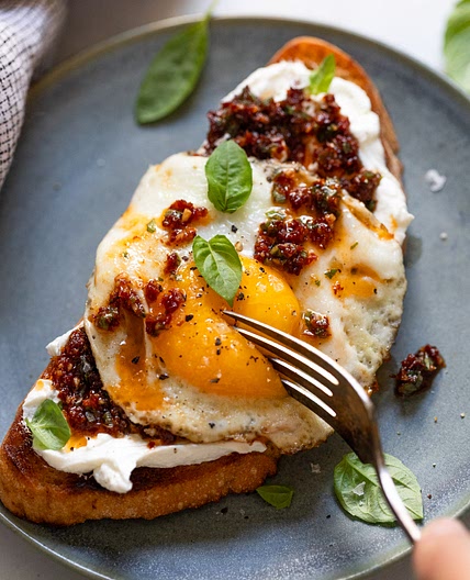 Goat Cheese Toast with Sun-Dried Tomatoes, Basil & Egg