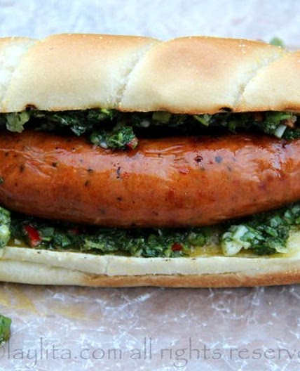 Choripan or chorizo hot dog with chimichurri sauce