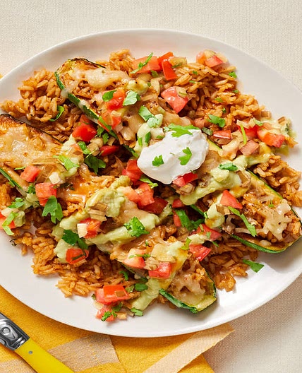 Southwest Stuffed Zucchini Boats with Plant-based Protein, Pico de Gallo & Avocado Crema