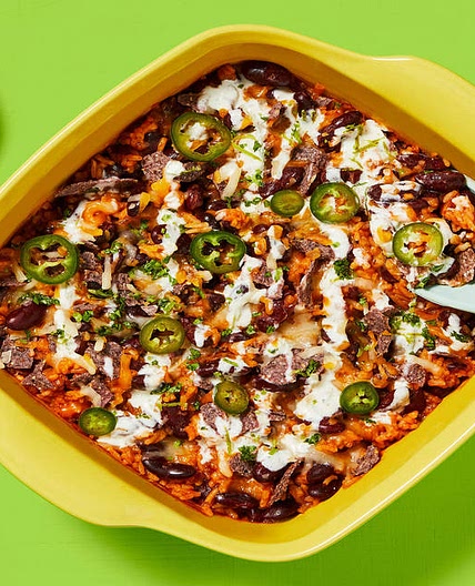 One-Pan Rice & Bean Enchilada Bake with Pickled Jalapeño, Zesty Crema & Blue Corn Tortilla Chips