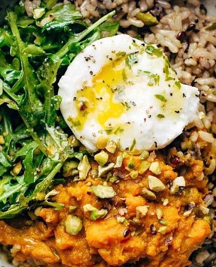 Healing Bowls with Turmeric Sweet Potatoes, Poached Eggs, and Lemon Dressing