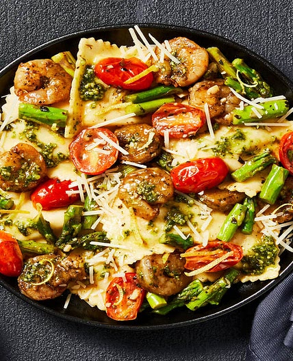 Pesto Shrimp & Lobster Filled Ravioli with Lemony Asparagus & Grape Tomatoes