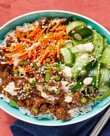 Pork Bulgogi Bowls with Carrots, Pickled Cucumber & Sriracha Crema