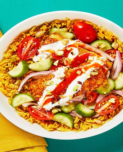 Shawarma-Spiced Halloumi with Pistachio Rice, Garlicky White Sauce & Israeli Salad