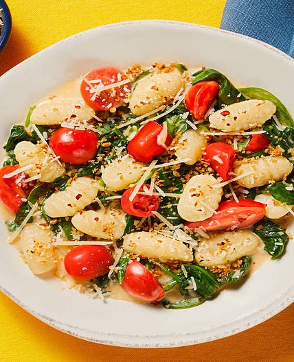 Gnocchi with Spinach & Grape Tomatoes topped with Garlic Butter Breadcrumbs