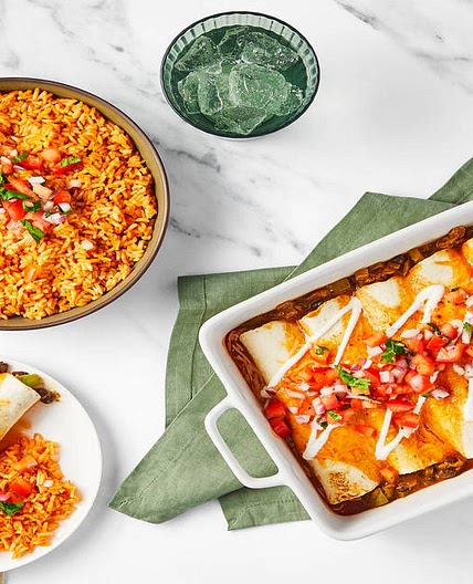 David Burtka’s Cheesy Chicken & Bean Enchiladas with Tomato Rice, Pico de Gallo & Lime Crema