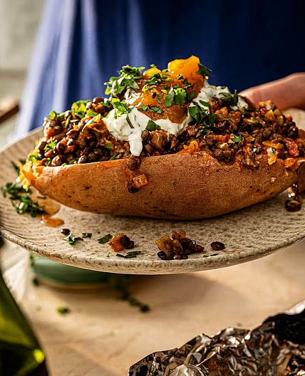 Spicy lentil jackets with cucumber yogurt & mango chutney