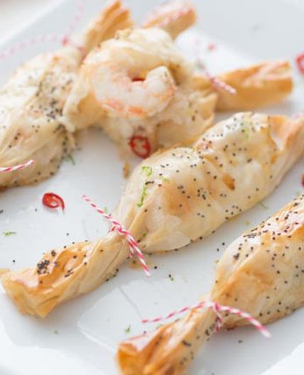 Pacchetti natalizi con scampi, zenzero e lime