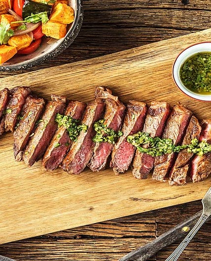 Argentine Chimichurri Steak with a Sweet Potato, Poblano, and Tomato Jumble