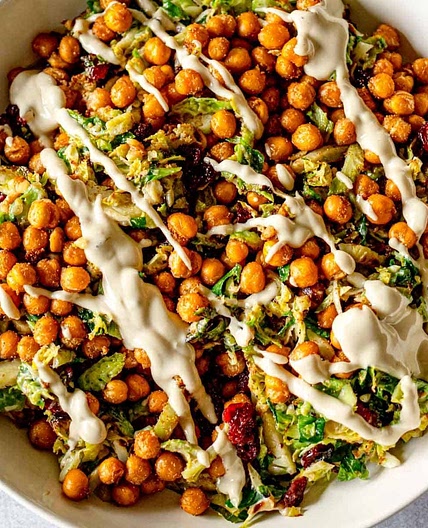 Shaved Brussels Sprouts Salad with Chickpeas and Lemon Tahini Dressing