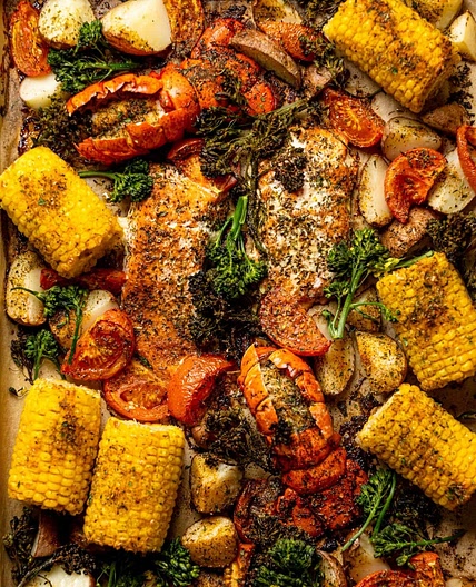 Sheet Pan Garlic Herb Salmon, Lobster, + Veggies