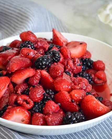 Gina Homolka's Macerated Berries with Greek Yogurt Whipped Cream