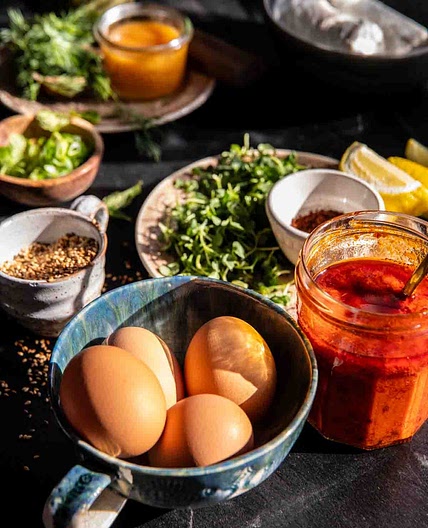 Harissa Eggs in Whipped Goat Cheese