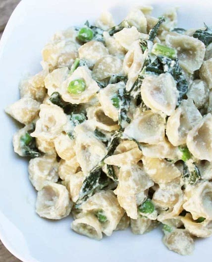 Creamy Pumpkin Seed Alfredo With Kale and Sweet Peas