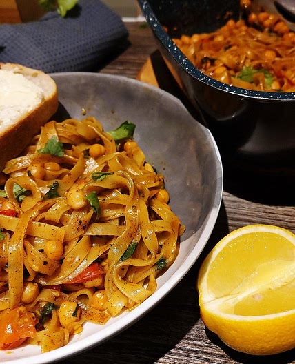 Fried Tagliatelle with Chickpeas and Tomatoes in Cajun Oil