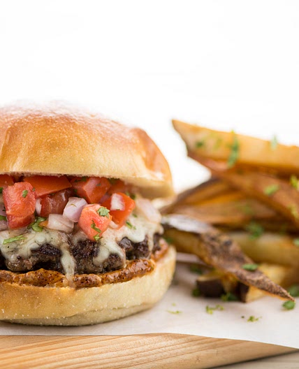 Acapulco Beef Burger with fresh pico de gallo and cilantro-lime fries