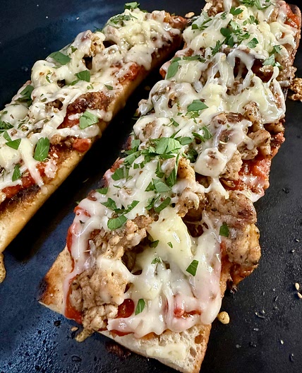 Blackstone Cheesy Sausage Baguettes