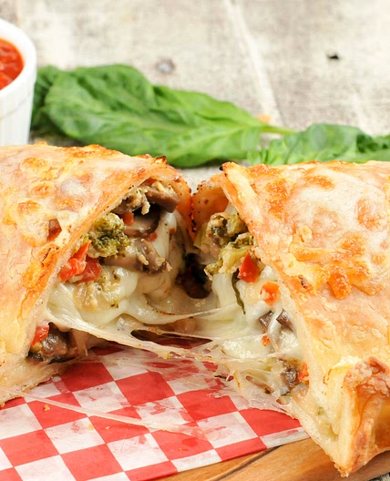 Calzone with Broccoli, Red Peppers, and Mushrooms with marinara dipping sauce