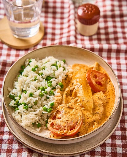 Chicken with Paprika and Tomatoes in a Creamy Sauce