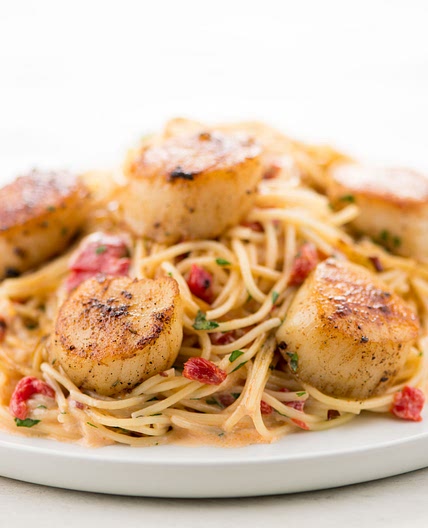 Blackened Scallop Pasta with red pepper cream